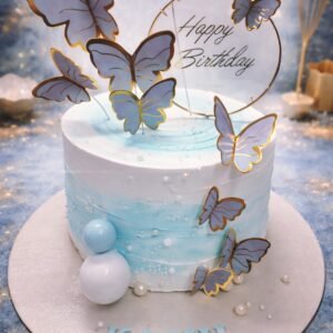 Blue and White Butterfly Floral Cake by Bakers Home Bengaluru