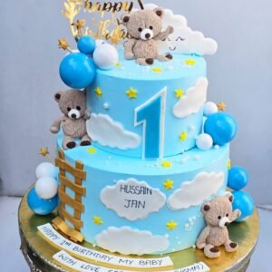 Blue and White Tiered Cake with Clouds by Bakers Home Bengaluru