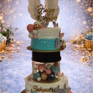 Colorful Tiered Cake with Bunny Topper by Bakers Home Bengaluru