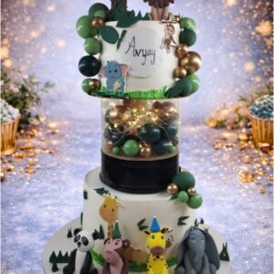 Green Tiered Cake with Animal Topper by Bakers Home Bengaluru