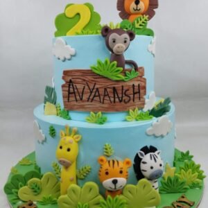 Safari Cake with Lion and Giraffe on Green Base by Bakers Home Bengaluru