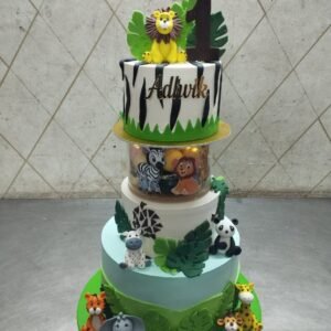 Tropical Jungle Animal Cake with Giraffe and Leaves by Bakers Home Bengaluru
